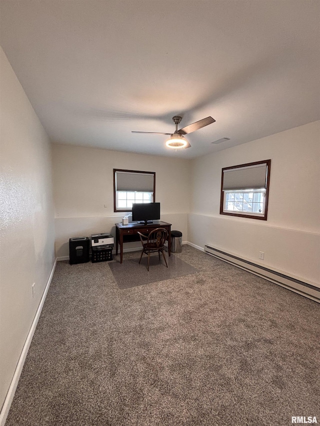 462 Circle Dr, Kewanee, IL 61443 - carpeted office space with baseboard heating, a ceiling fan, and baseboards