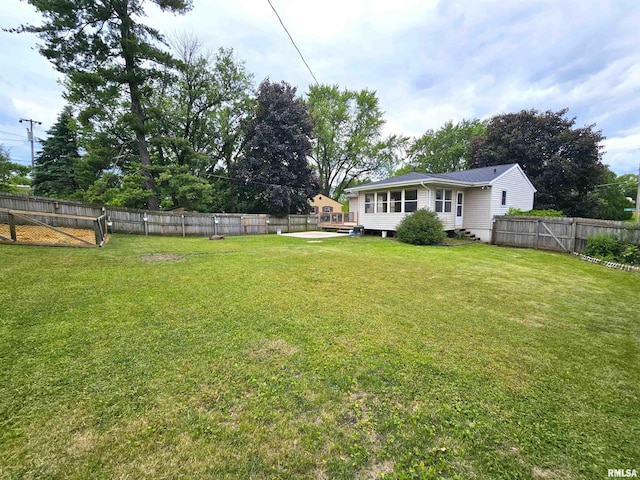 4325 N Lincoln Ave, Davenport, IA 52806 - view of yard with a wooden deck