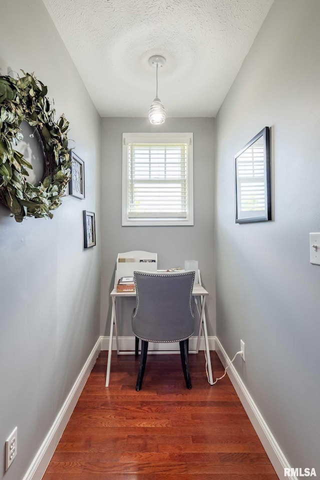3160 Sycamore Rd, Carterville, IL 62918 - office featuring a textured ceiling, dark wood finished floors, and baseboards