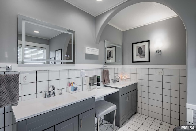 3160 Sycamore Rd, Carterville, IL 62918 - bathroom featuring tile walls, double vanity, tile patterned floors, a wainscoted wall, and crown molding