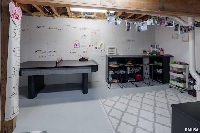 3160 Sycamore Rd, Carterville, IL 62918 - recreation room featuring a workshop area and finished concrete floors