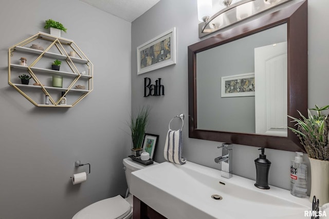 3160 Sycamore Rd, Carterville, IL 62918 - bathroom with toilet and vanity