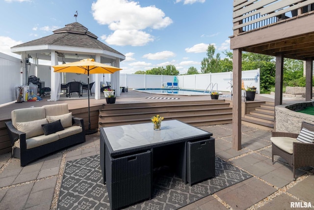 3160 Sycamore Rd, Carterville, IL 62918 - fenced backyard featuring outdoor dining area, a gazebo, a deck, an outdoor living space, and a patio area