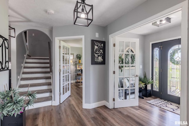 3160 Sycamore Rd, Carterville, IL 62918 - entrance foyer with wood finished floors, baseboards, stairs, and french doors