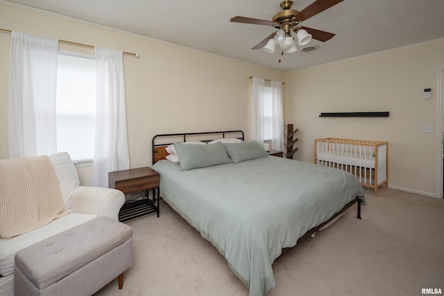 807 Spalding Blvd, Davenport, IA 52804 - bedroom featuring light colored carpet, ornamental molding, and ceiling fan