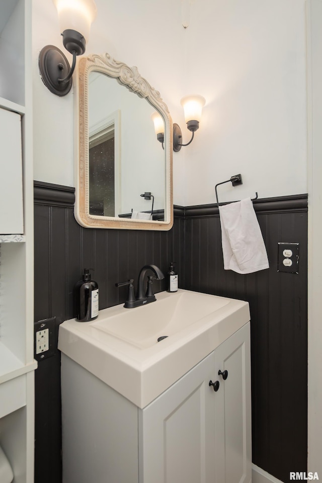 807 Spalding Blvd, Davenport, IA 52804 - bathroom with vanity and wainscoting