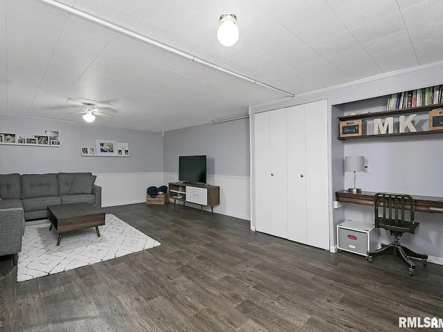 807 Spalding Blvd, Davenport, IA 52804 - living area featuring wood finished floors, ceiling fan, and wainscoting