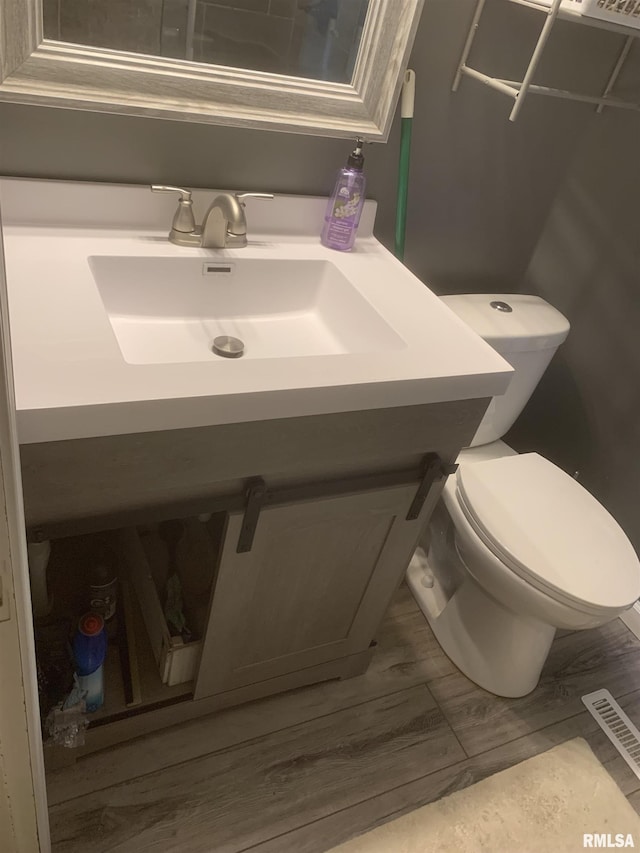 1424 29th Ave, Moline, IL 61265 - bathroom featuring vanity and wood finished floors
