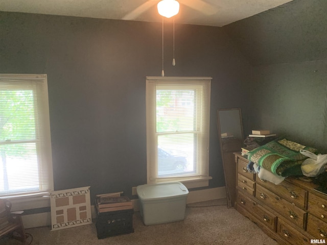 1424 29th Ave, Moline, IL 61265 - bedroom with light colored carpet, lofted ceiling, and ceiling fan