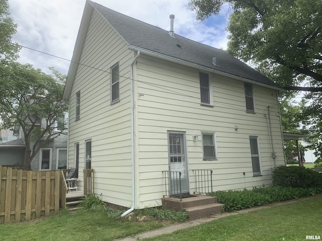 1424 29th Ave, Moline, IL 61265 - rear view of property featuring a shingled roof