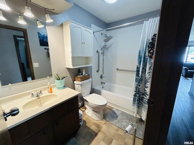 709S 4th St S, Maquoketa, IA 52060 - full bath featuring shower / bath combination with curtain, toilet, and vanity