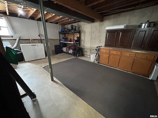 709S 4th St S, Maquoketa, IA 52060 - below grade area with fridge