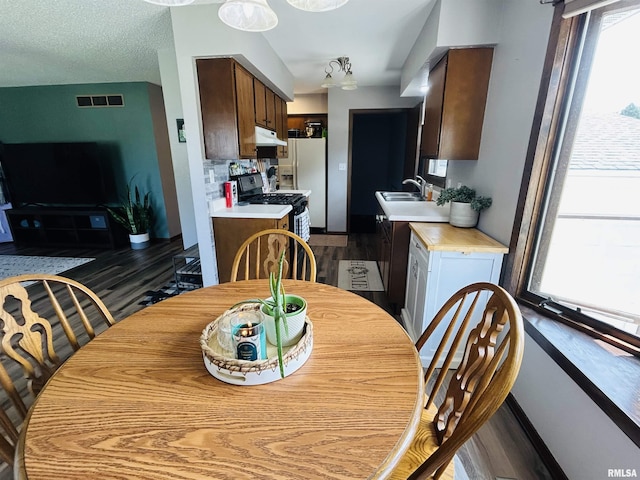 709S 4th St S, Maquoketa, IA 52060 - dining area with wood finished floors