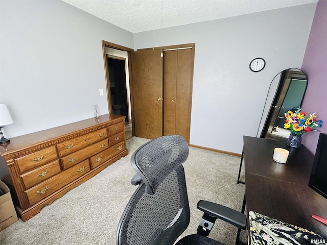 709S 4th St S, Maquoketa, IA 52060 - office area with carpet floors, a textured ceiling, and baseboards
