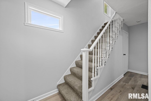 1156 23rd St, Moline, IL 61265 - stairway featuring wood finished floors