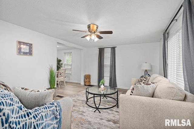 1156 23rd St, Moline, IL 61265 - living room with wood finished floors and a ceiling fan