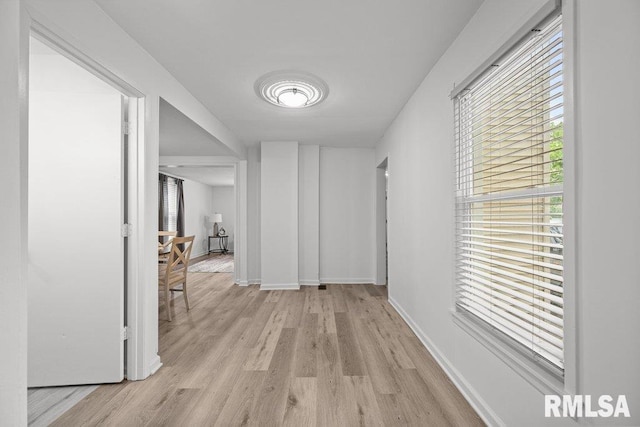 1156 23rd St, Moline, IL 61265 - corridor with light wood-style floors and baseboards