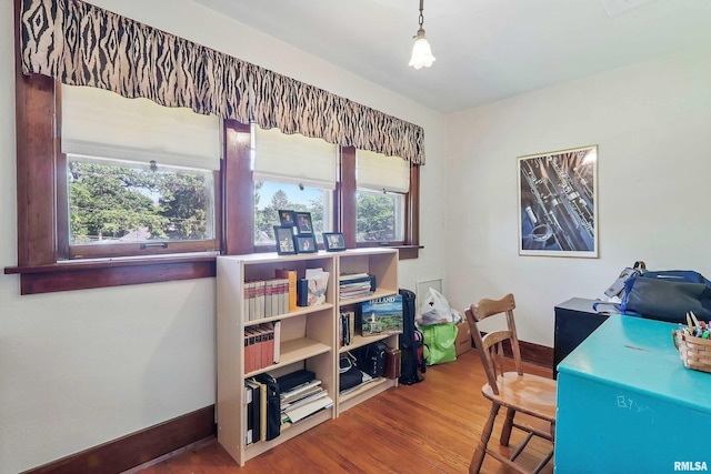 924 Brown St, Bettendorf, IA 52722 - office area featuring wood finished floors and baseboards