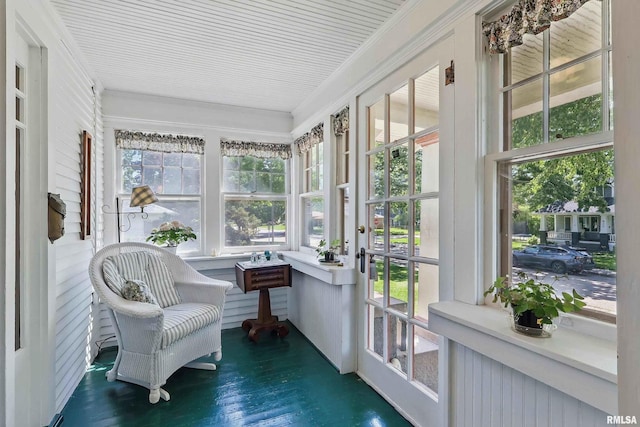 924 Brown St, Bettendorf, IA 52722 - sunroom with wood finished floors and ornamental molding