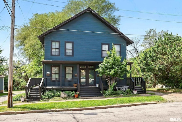 1931 E 11th St, Davenport, IA 52803 - view of front of house with a porch and stairway