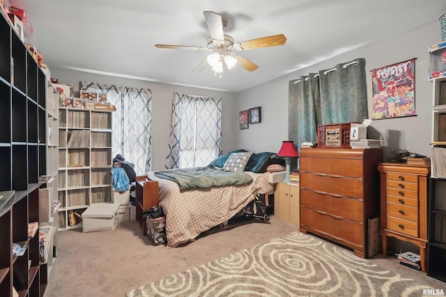 1931 E 11th St, Davenport, IA 52803 - bedroom with carpet flooring and a ceiling fan