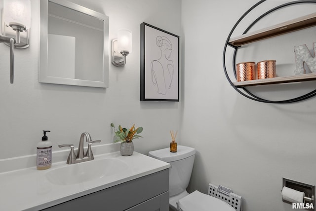 28013 230th St, Le Claire, IA 52753 - bathroom featuring toilet and vanity