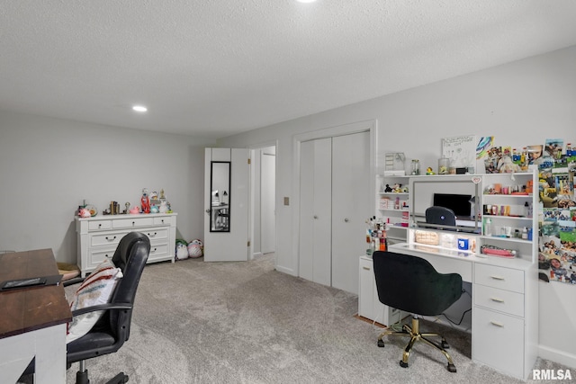 28013 230th St, Le Claire, IA 52753 - home office featuring light colored carpet, a textured ceiling, and recessed lighting