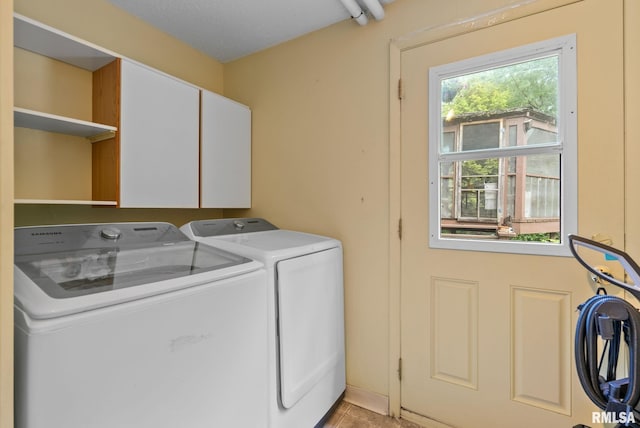 28013 230th St, Le Claire, IA 52753 - laundry room featuring cabinet space and washer and clothes dryer