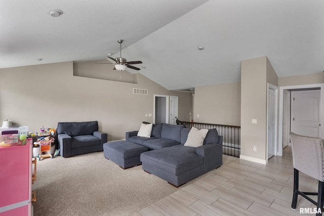 1625 W 71st St, Davenport, IA 52806 - living room with vaulted ceiling, a ceiling fan, baseboards, and wood tiled floors