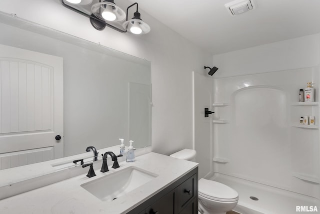 1625 W 71st St, Davenport, IA 52806 - full bath featuring vanity, toilet, and a shower