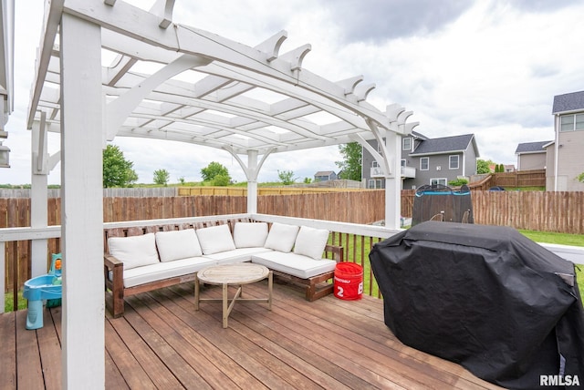 1625 W 71st St, Davenport, IA 52806 - wooden terrace with a pergola, a fenced backyard, an outdoor living space, and area for grilling