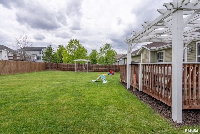 1625 W 71st St, Davenport, IA 52806 - view of yard featuring a playground, a pergola, and a wooden deck