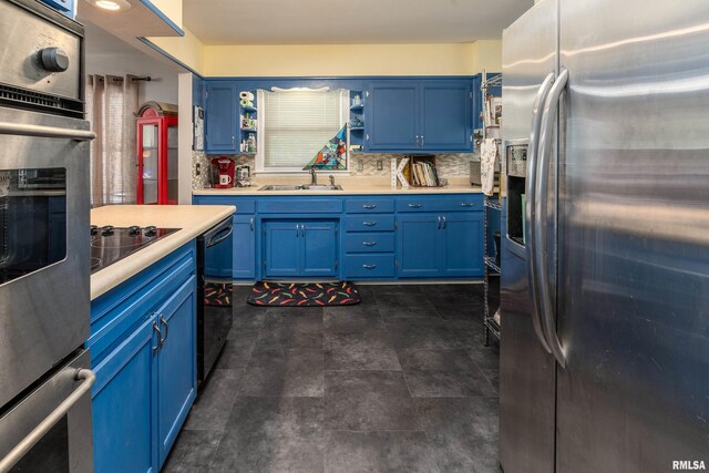 615 W Grand Ave, Carterville, IL 62918 - kitchen featuring black appliances, blue cabinetry, a sink, and open shelves
