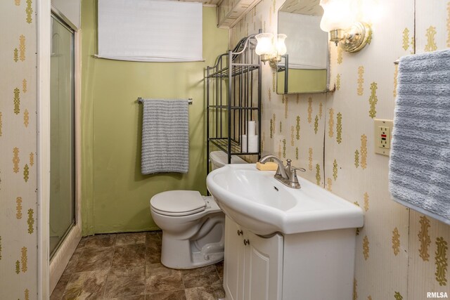 615 W Grand Ave, Carterville, IL 62918 - full bath with a shower stall, toilet, vanity, and wallpapered walls