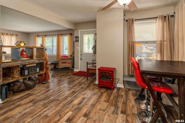 615 W Grand Ave, Carterville, IL 62918 - dining room with wood finished floors, baseboards, and ceiling fan
