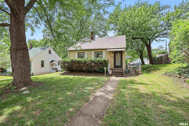 3414 Fillmore Ln, Davenport, IA 52806 - bungalow featuring a chimney