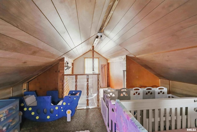 3414 Fillmore Ln, Davenport, IA 52806 - bedroom featuring lofted ceiling, wood walls, carpet floors, and wooden ceiling