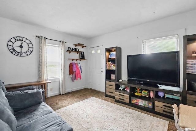 3414 Fillmore Ln, Davenport, IA 52806 - carpeted living room featuring baseboards