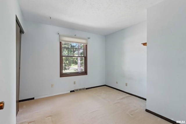 3845 Norwich Ct, Bettendorf, IA 52722 - spare room with carpet and baseboards