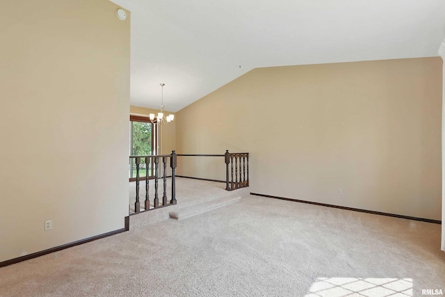 3845 Norwich Ct, Bettendorf, IA 52722 - carpeted empty room with a chandelier, lofted ceiling, and baseboards