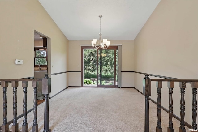 3845 Norwich Ct, Bettendorf, IA 52722 - empty room with vaulted ceiling, a chandelier, baseboards, carpet, and plenty of natural light