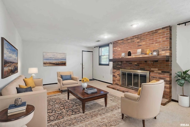 3845 Norwich Ct, Bettendorf, IA 52722 - living room with baseboards and a brick fireplace