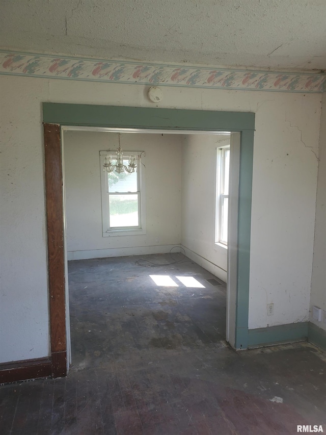 2208 E Locust St, Davenport, IA 52803 - empty room with a chandelier