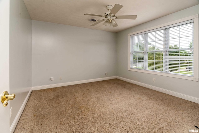 1404 Belle Terre Ct, Herrin, IL 62948 - carpeted empty room with baseboards and ceiling fan