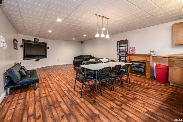 1404 Belle Terre Ct, Herrin, IL 62948 - dining room with recessed lighting, dark wood finished floors, baseboards, and a glass covered fireplace