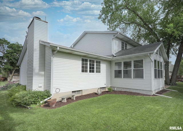 4760 Apple Valley Dr, Bettendorf, IA 52722 - back of property featuring a yard and a chimney