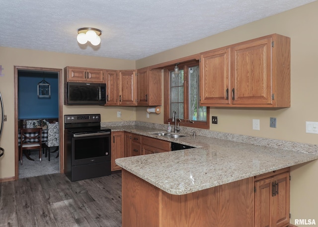 4760 Apple Valley Dr, Bettendorf, IA 52722 - kitchen with electric range oven, a sink, a peninsula, brown cabinetry, and a textured ceiling