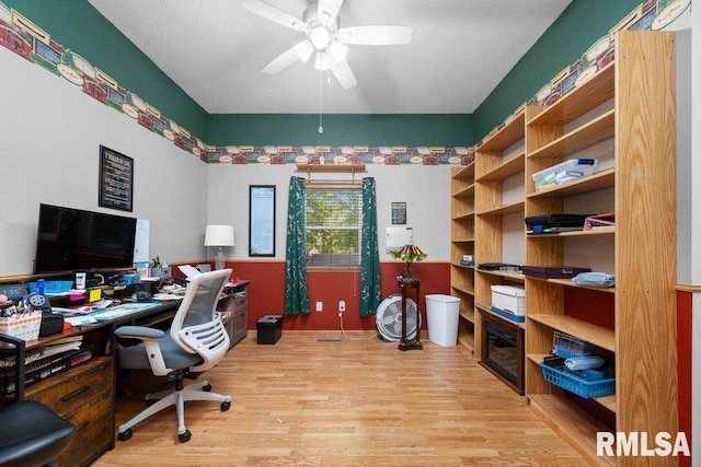 911 Cardinal Dr, Maquoketa, IA 52060 - office space with wood finished floors and a ceiling fan