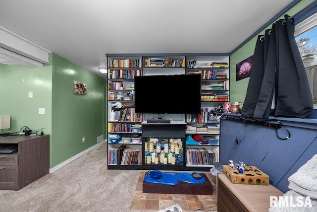 911 Cardinal Dr, Maquoketa, IA 52060 - interior space with carpet and baseboards