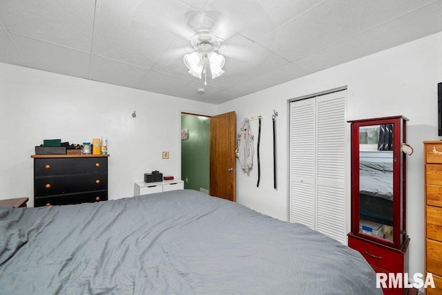 911 Cardinal Dr, Maquoketa, IA 52060 - bedroom featuring a closet and ceiling fan